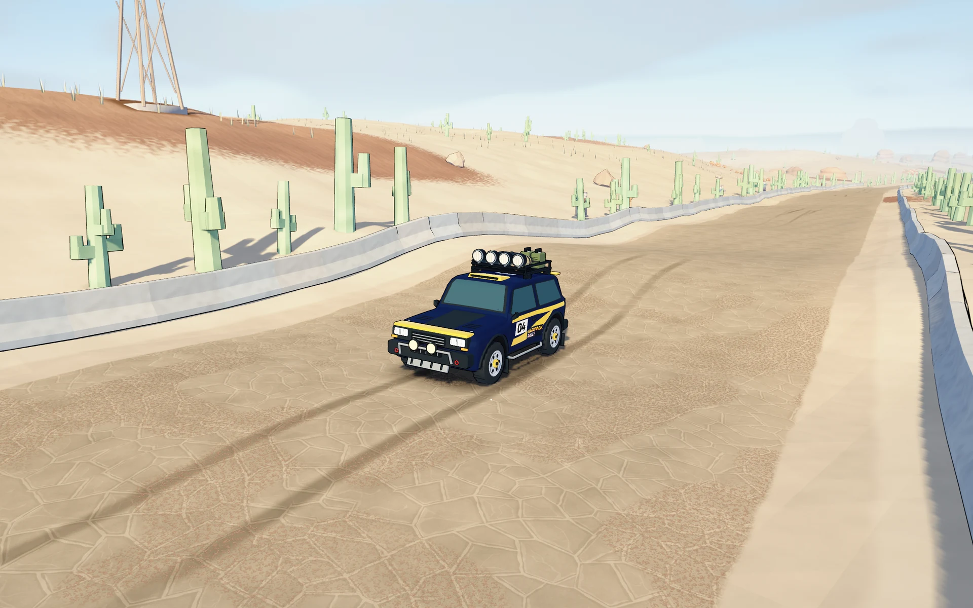 The Atlas Raid on a sandy desert rally road.
